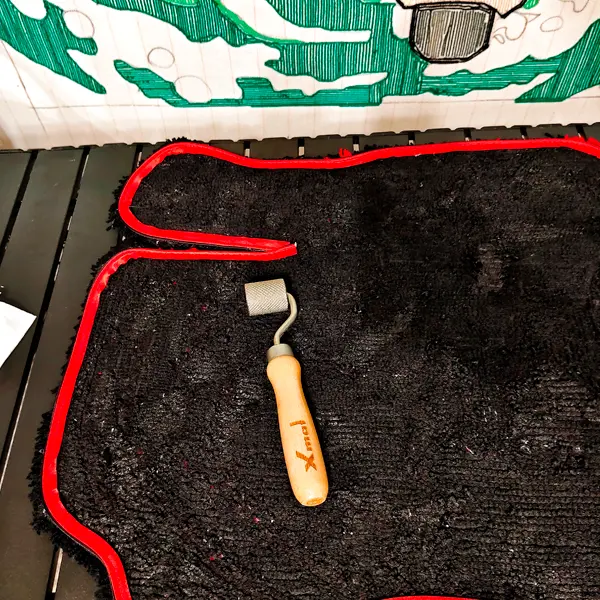 окантовка ковра в автомобиль при изготовлении